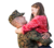 U.S. military couple hugging affectionately