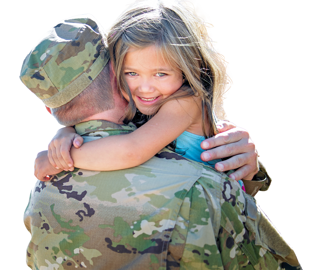 service member father embracing his young daughter
