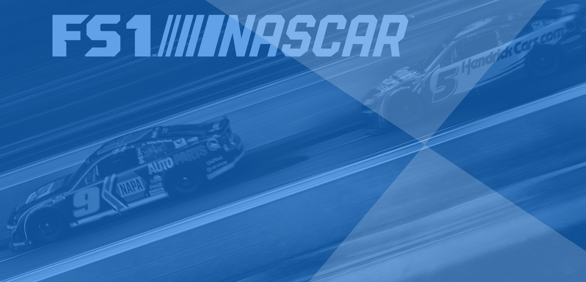automobile racetrack with FS1 NASCAR banner