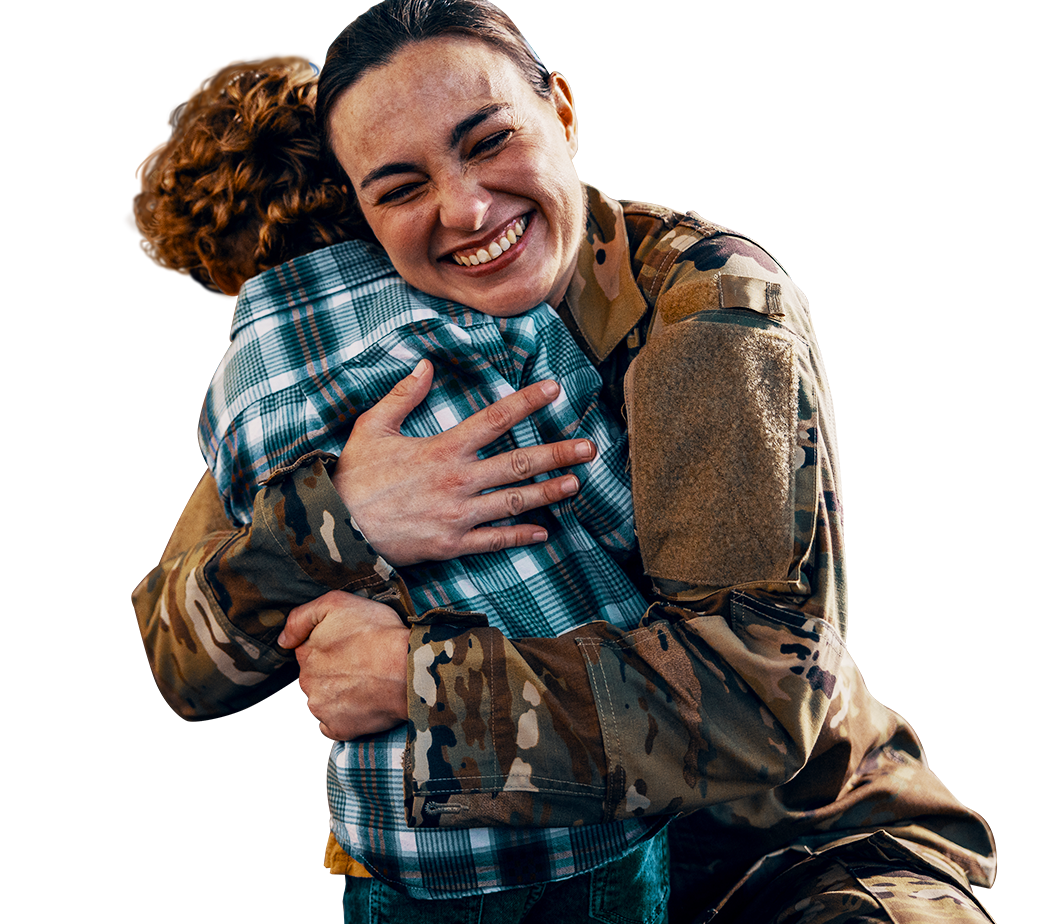 service member mom warmly embracing her small son
