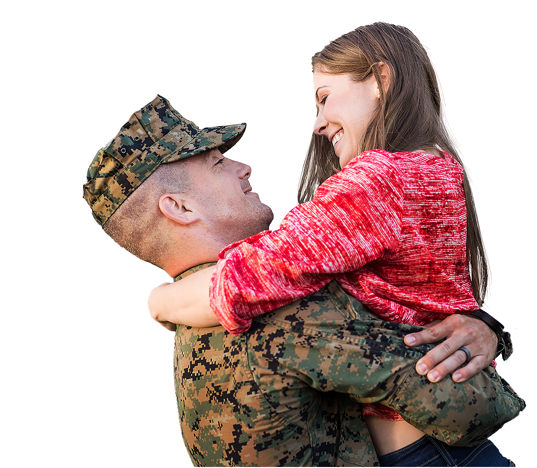 U.S. military couple hugging affectionately